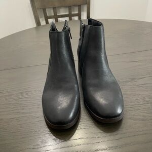 Black ankle boots never worn side zip original box size 9 1/2 wide.